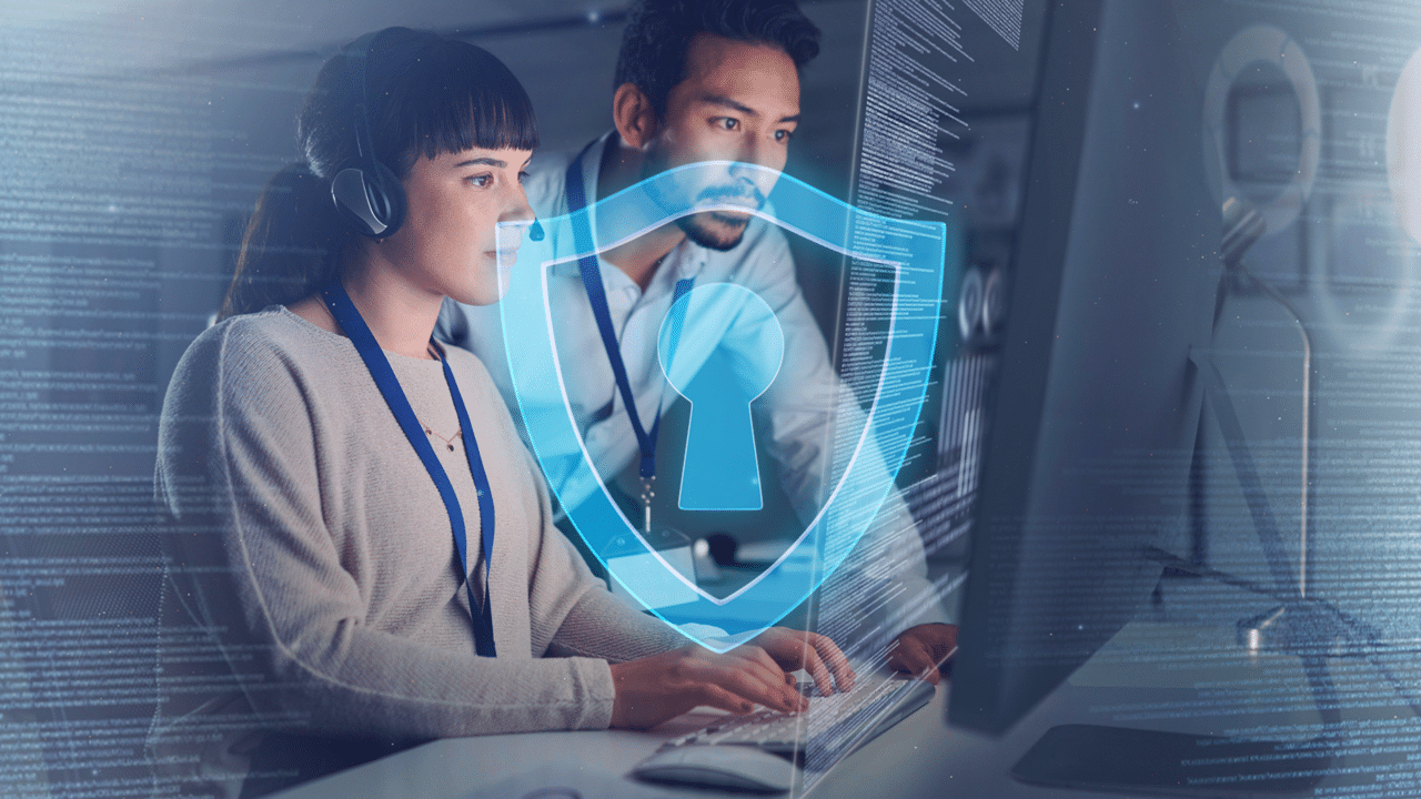 Two professionals with headsets in a high-tech Azulle work environment, focusing on cybersecurity.