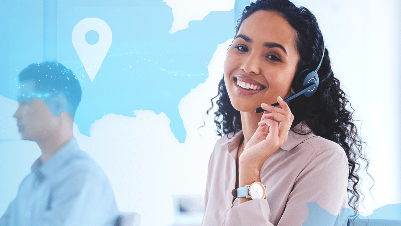 Customer service representative with a headset smiling in front of a digital world map interface, assisting customers with Azulle enhanced operations.