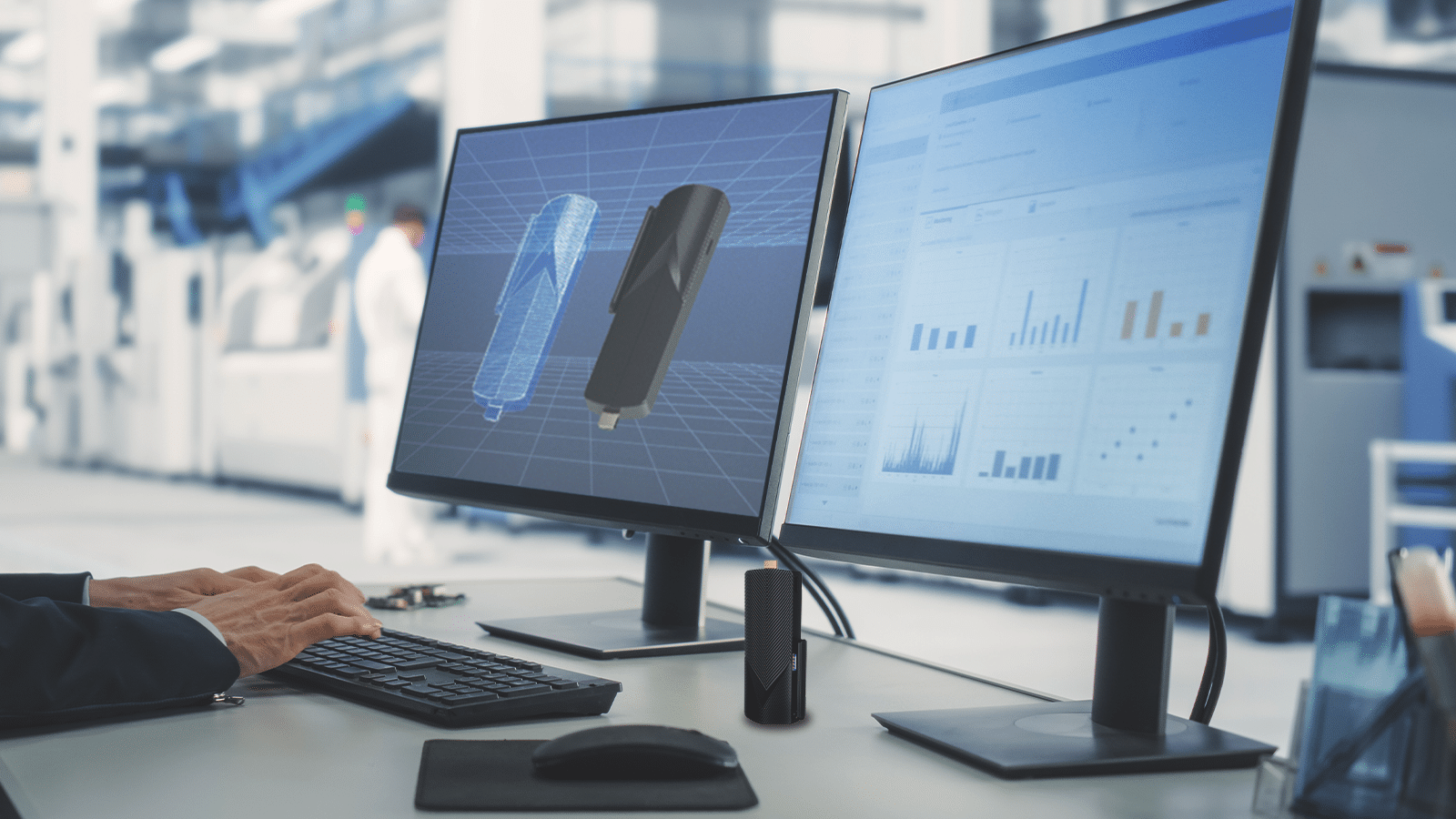 A mini PC being showcased on two screens, displaying its design or features in a visual presentation.