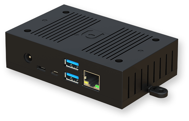 A small black rectangular electronic device with ventilation slits, USB ports, Ethernet port, and power input visible on one side.