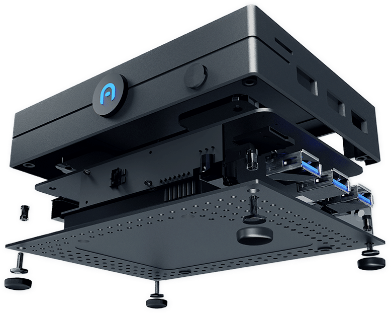 Exploded view of an Azulle mini pc's compact black computer chassis showing internal components, ports, screws, and bottom plate separated and suspended.