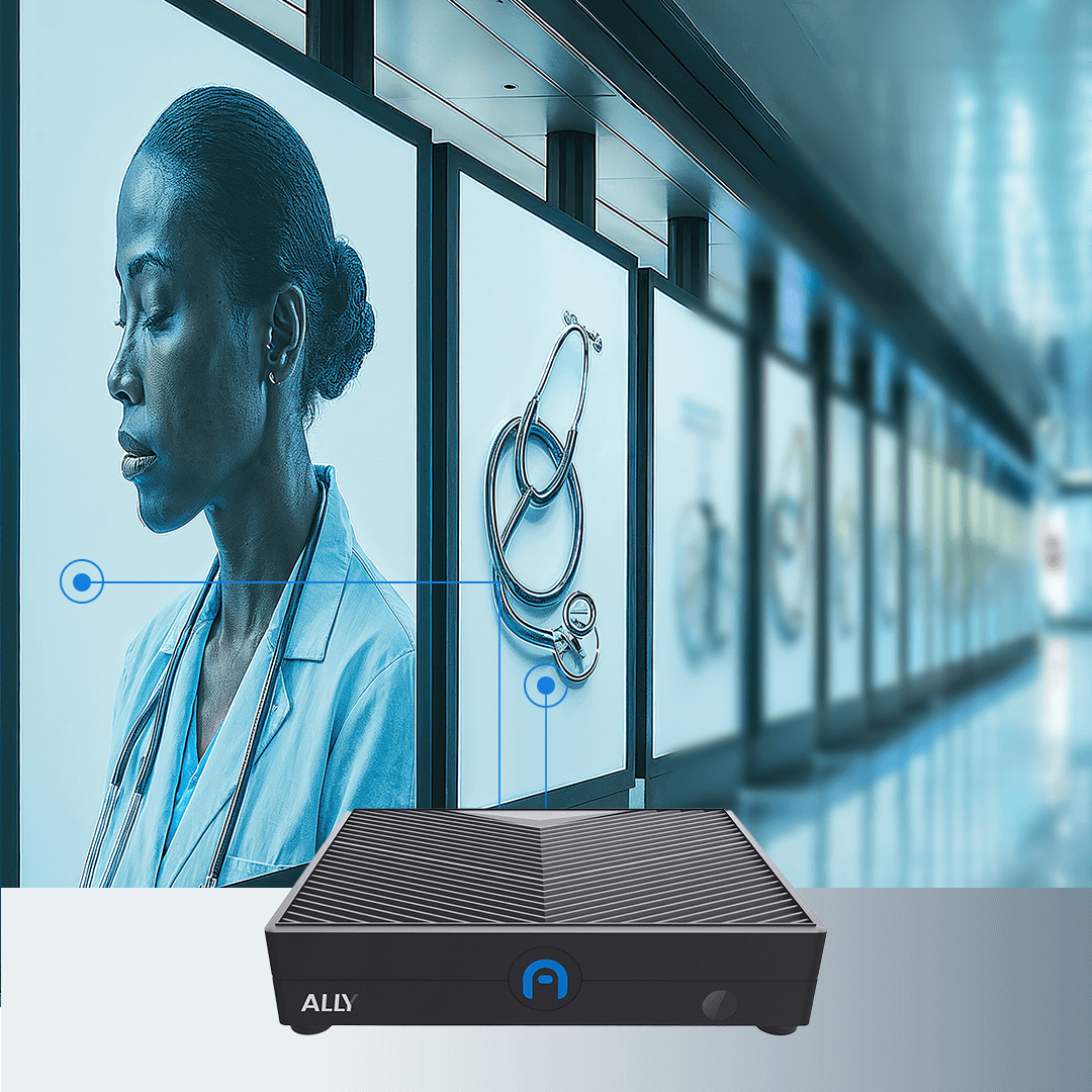 A female doctor stands in profile overlaid on medical-themed digital displays in a corridor, with a black device labeled "ALLY" in the foreground.