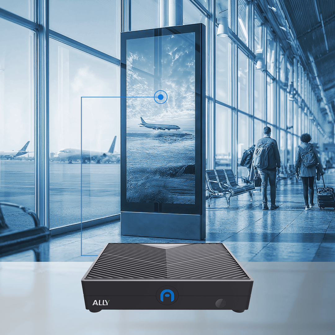 A digital display shows an airplane image in an airport terminal with two travelers walking nearby; a compact device labeled ALLY is shown in the foreground.