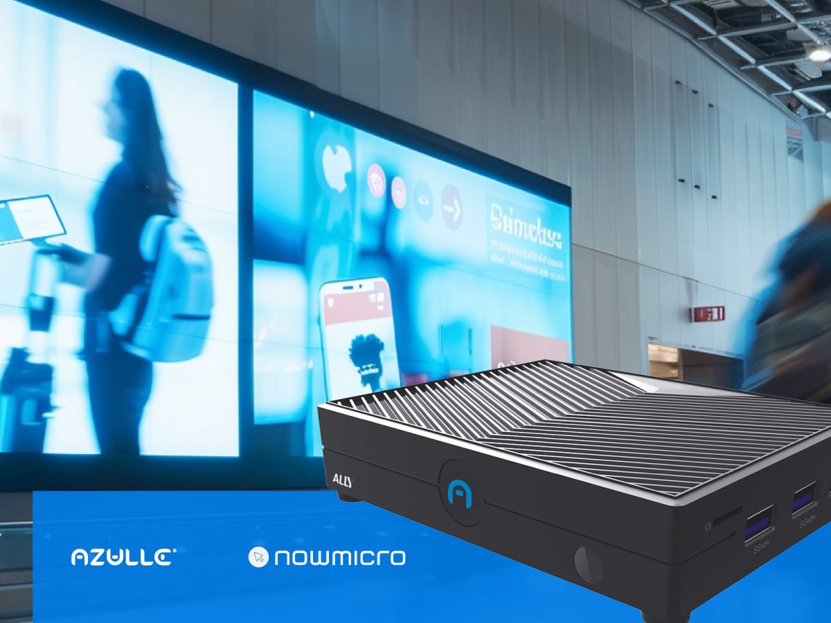 A compact Azulle mini PC is shown in the foreground with a blurred indoor digital signage display and people in the background. Azulle and NowMicro logos appear at the bottom.